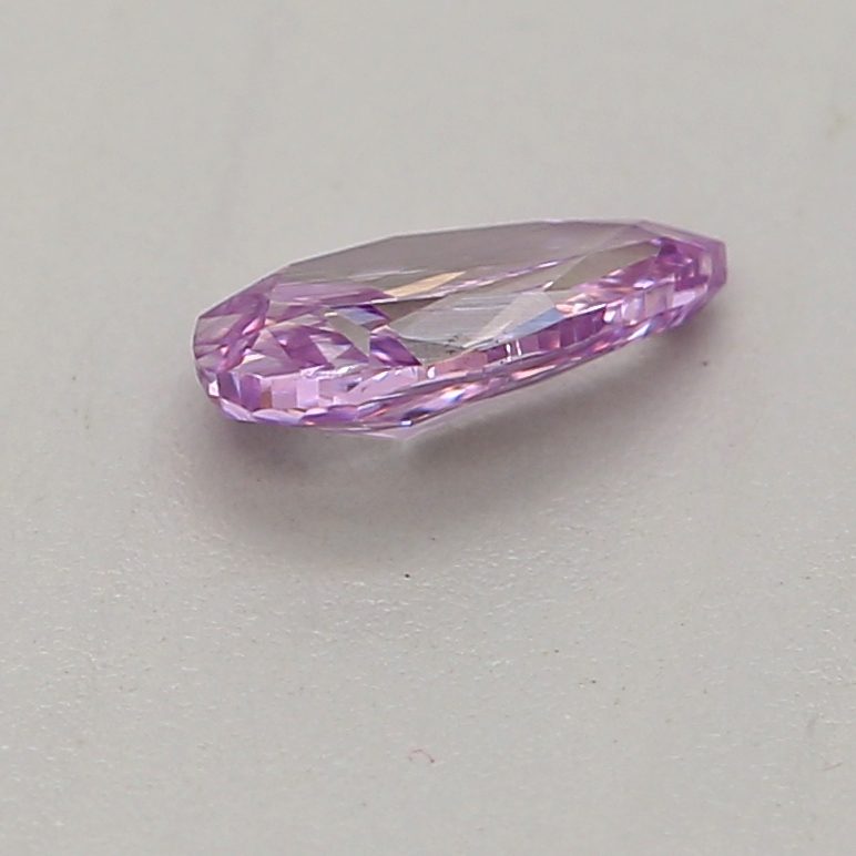 0.16 carat fancy intense pinkish purple pear diamond certified by GIA