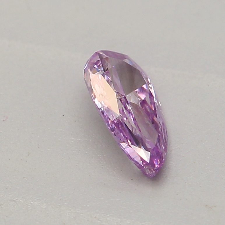 0.16 carat fancy intense pinkish purple pear diamond certified by GIA