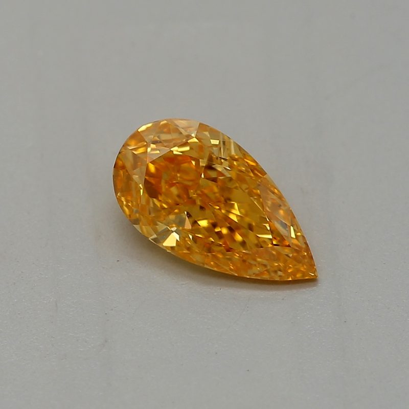 0.33 carat fancy vivid yellow-orange pear diamond certified by GIA