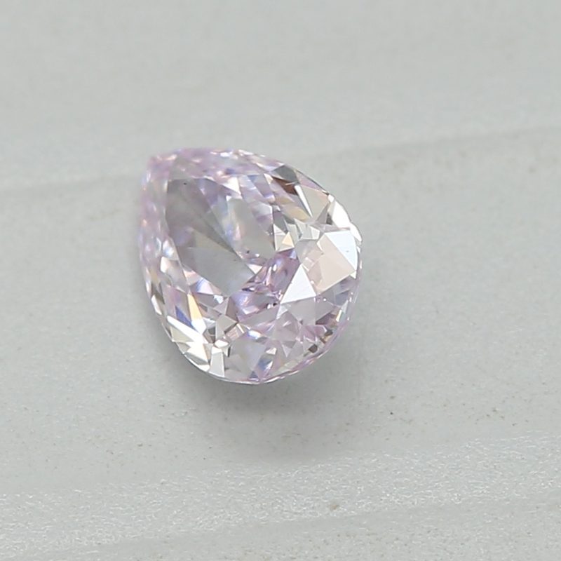 0.22 carat fancy pinkish purple pear diamond certified by GIA