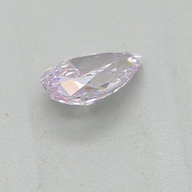 0.22 carat fancy pinkish purple pear diamond certified by GIA