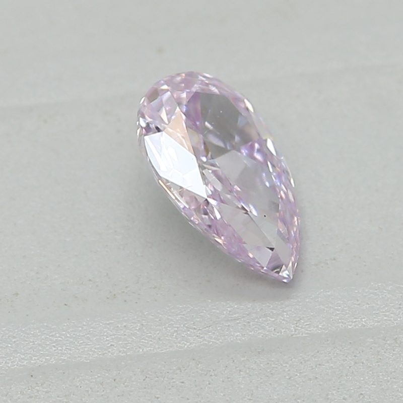 0.22 carat fancy pinkish purple pear diamond certified by GIA