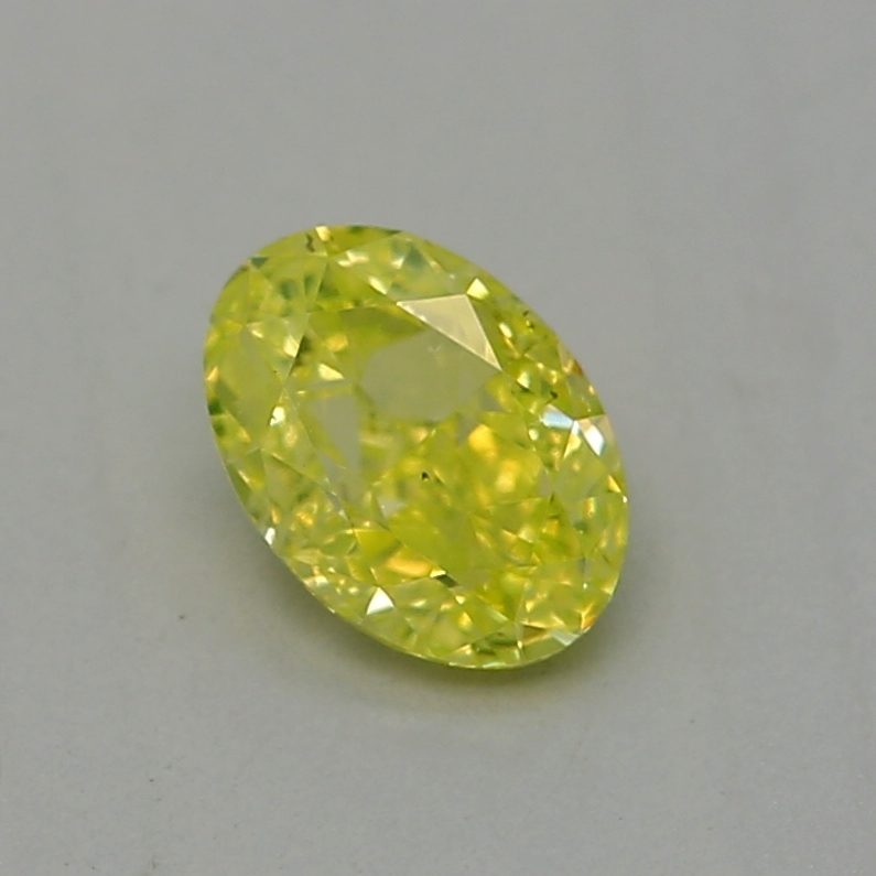 0.23 carat fancy intense green-yellow oval diamond certified by GIA