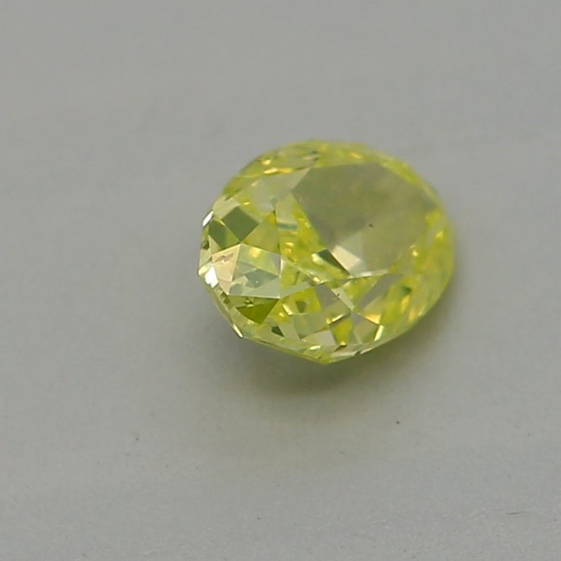 0.23 carat fancy intense green-yellow oval diamond certified by GIA