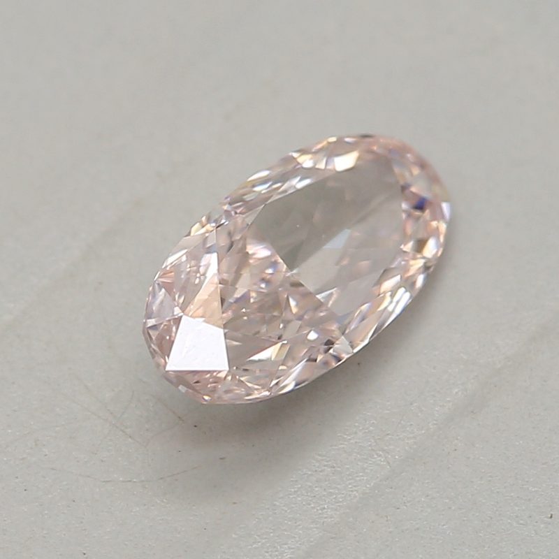 0.31 carat light pink oval diamond certified by GIA