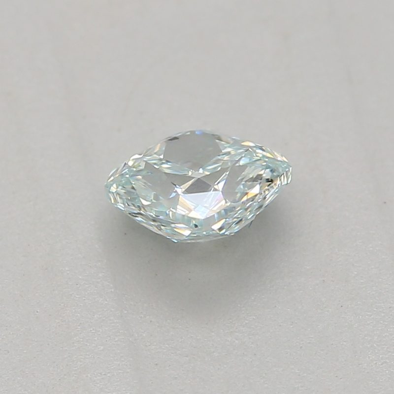 0.25 carat fancy green-blue cushion diamond certified by GIA