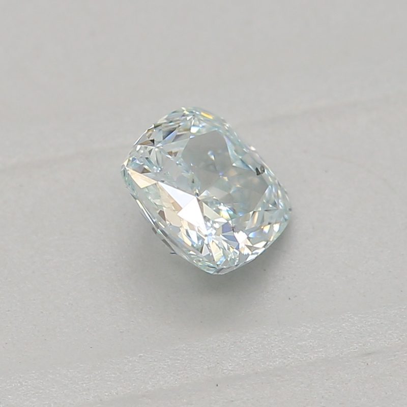 0.25 carat fancy green-blue cushion diamond certified by GIA