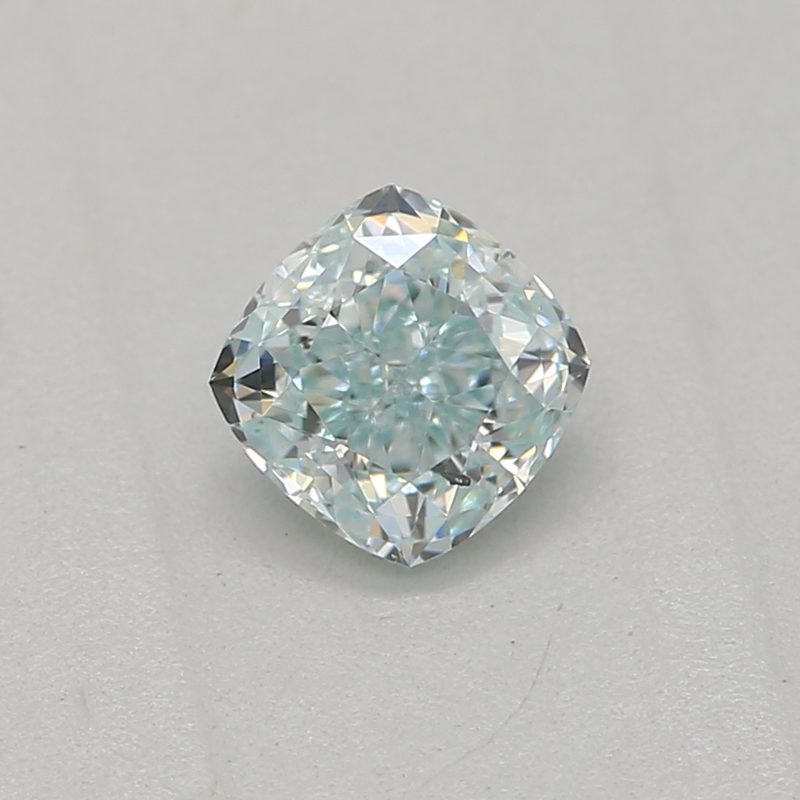 0.25 carat fancy green-blue cushion diamond certified by GIA