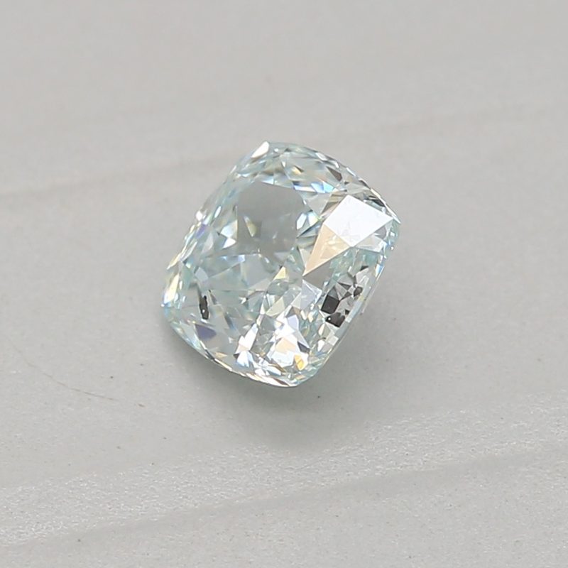 0.25 carat fancy green-blue cushion diamond certified by GIA