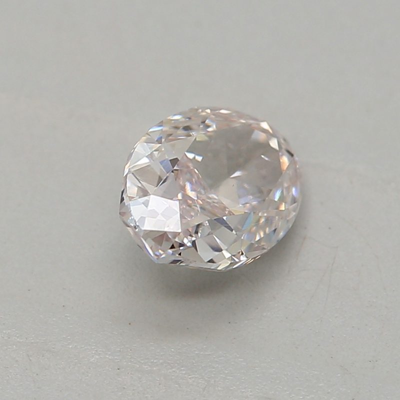 0.36 carat very light pink oval diamond certified by GIA
