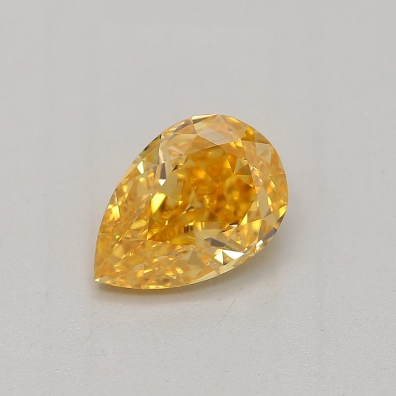 0.51 carat fancy vivid orange-yellow pear diamond certified by GIA