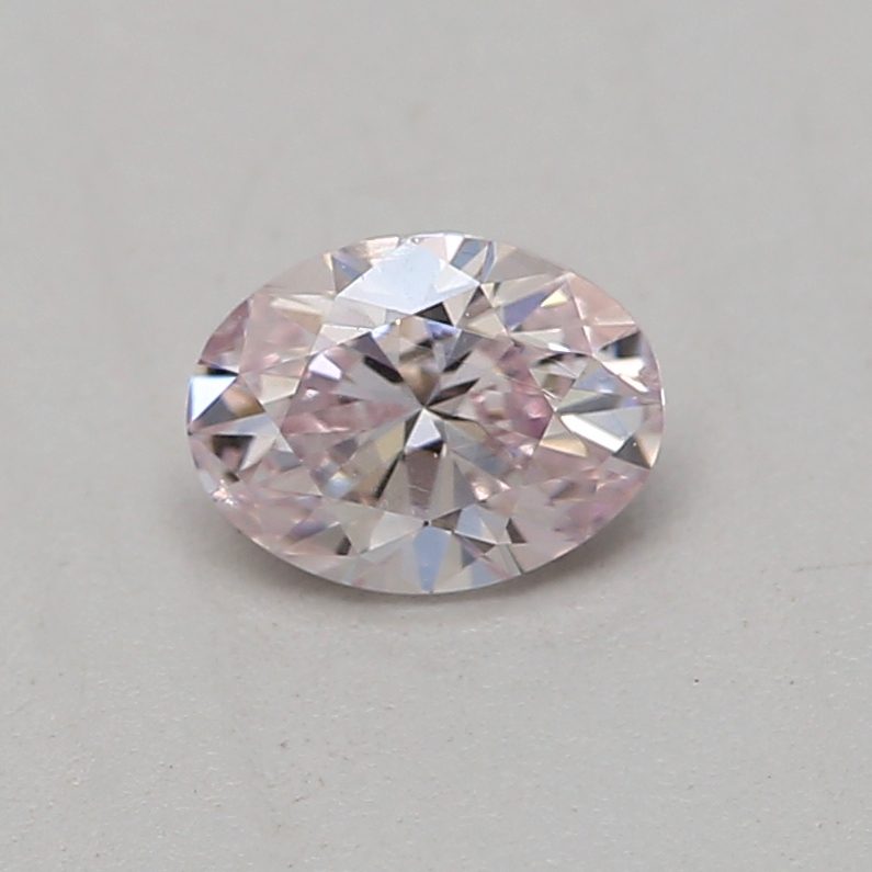 0.18 carat light pink oval diamond certified by GIA