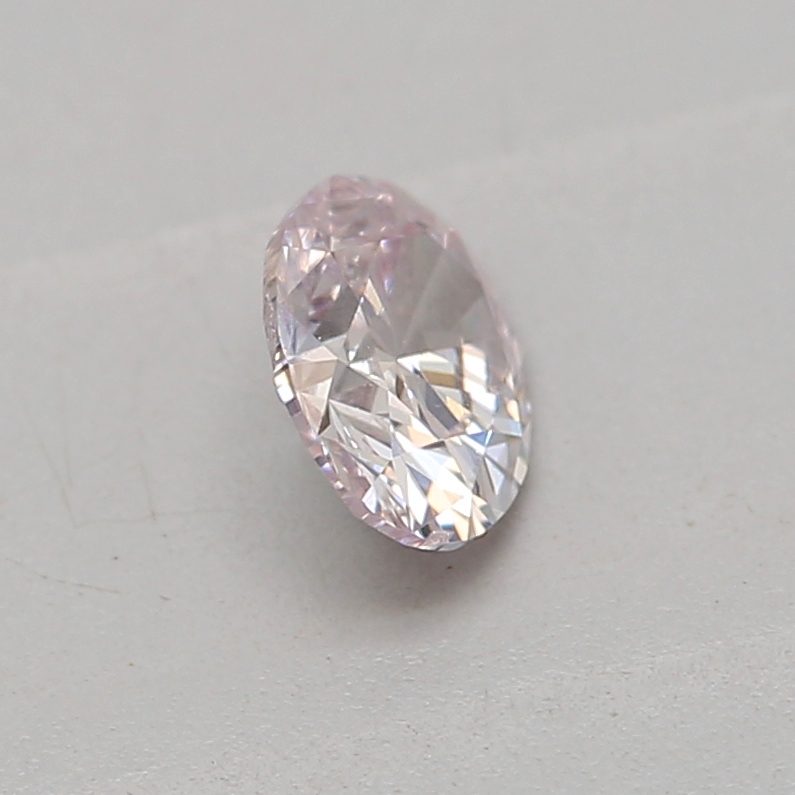 0.18 carat light pink oval diamond certified by GIA