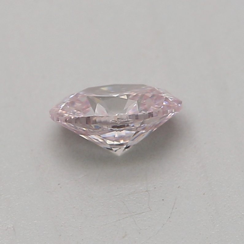 0.18 carat light pink oval diamond certified by GIA