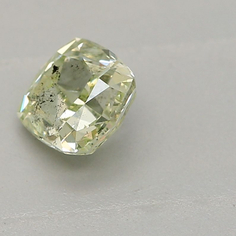 0.32 carat fancy yellow-green cushion diamond certified by GIA