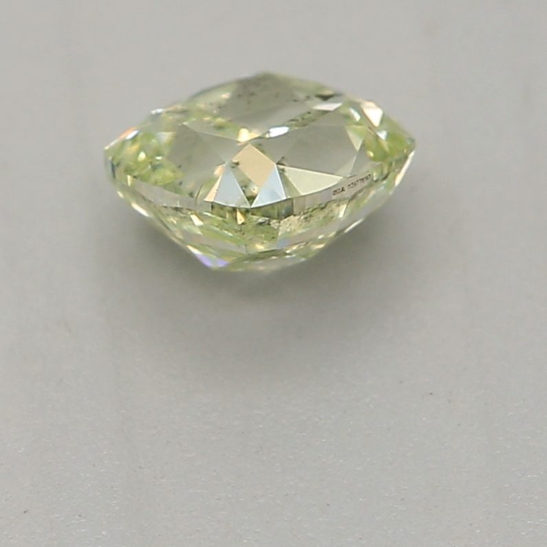 0.32 carat fancy yellow-green cushion diamond certified by GIA
