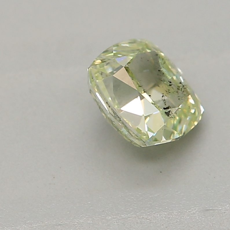 0.32 carat fancy yellow-green cushion diamond certified by GIA