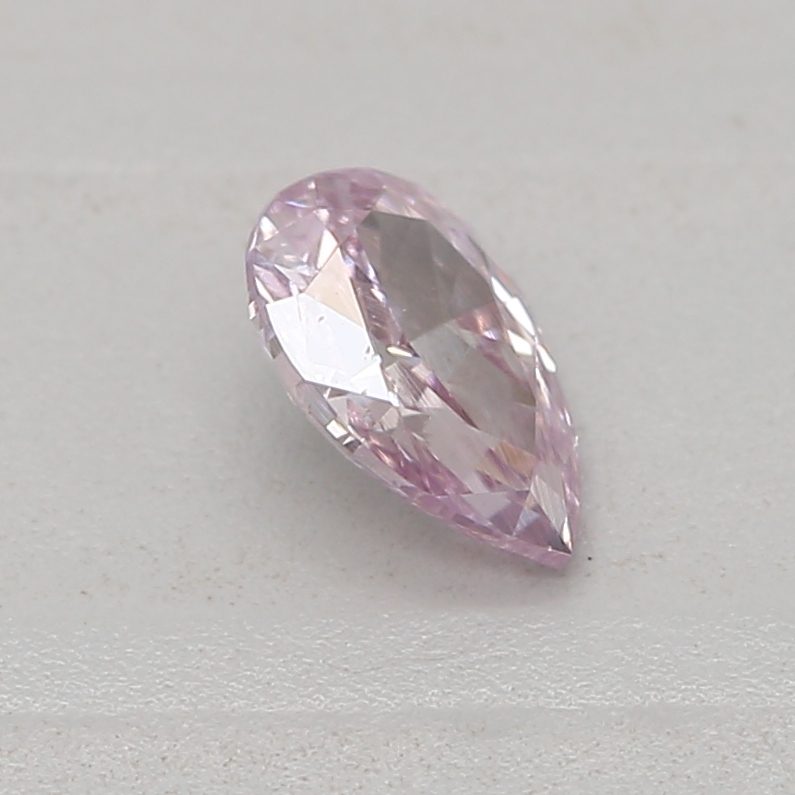 0.18 carat fancy purple-pink pear diamond certified by GIA