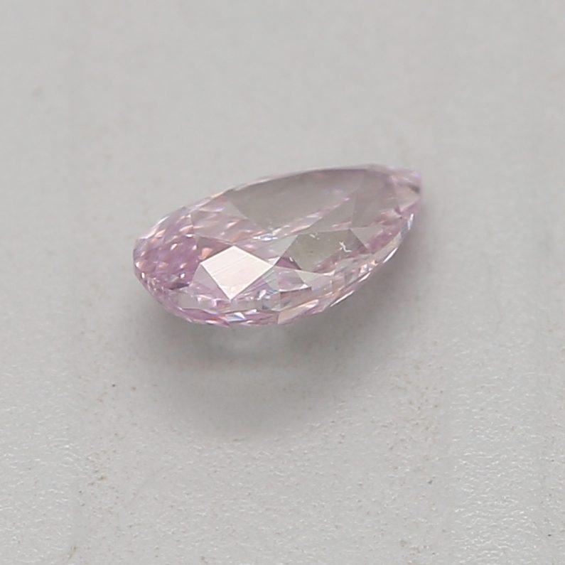 0.18 carat fancy purple-pink pear diamond certified by GIA