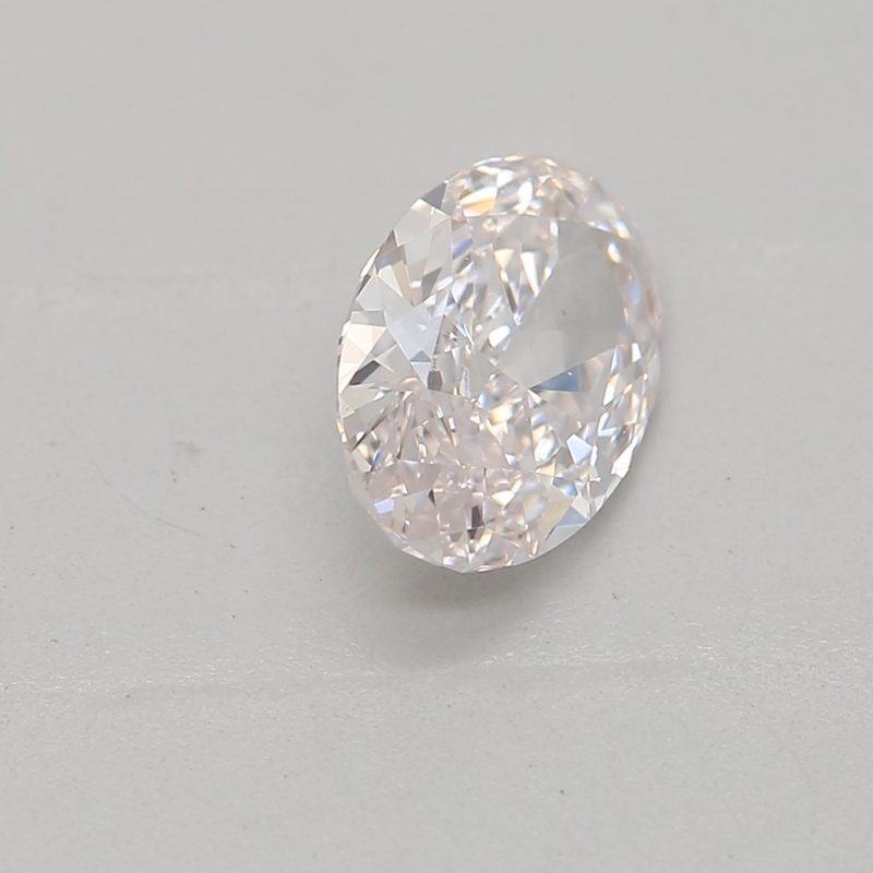 0.47 carat faint pink oval diamond certified by GIA