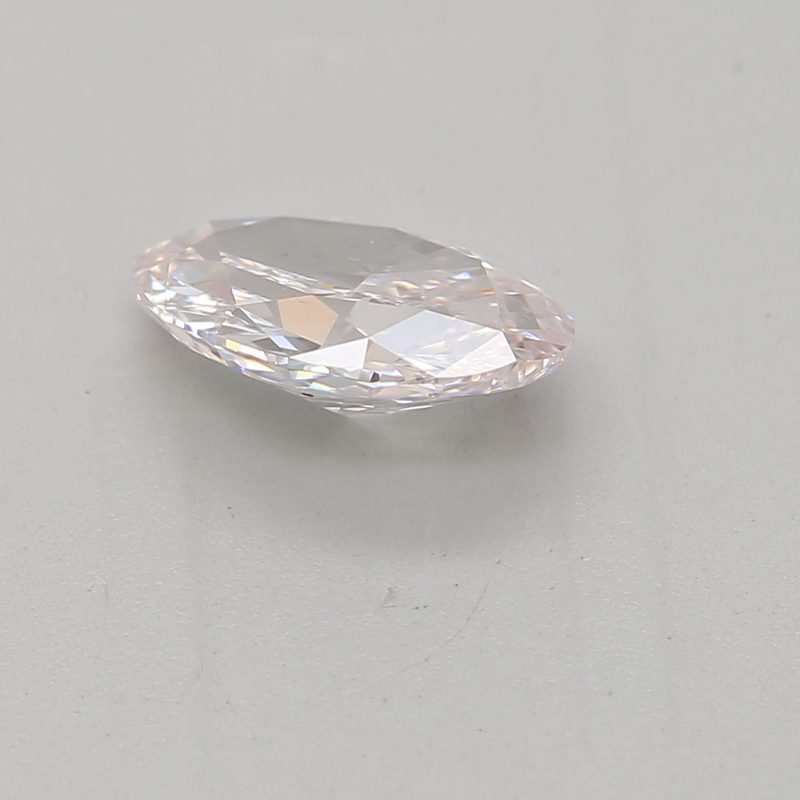 0.47 carat faint pink oval diamond certified by GIA