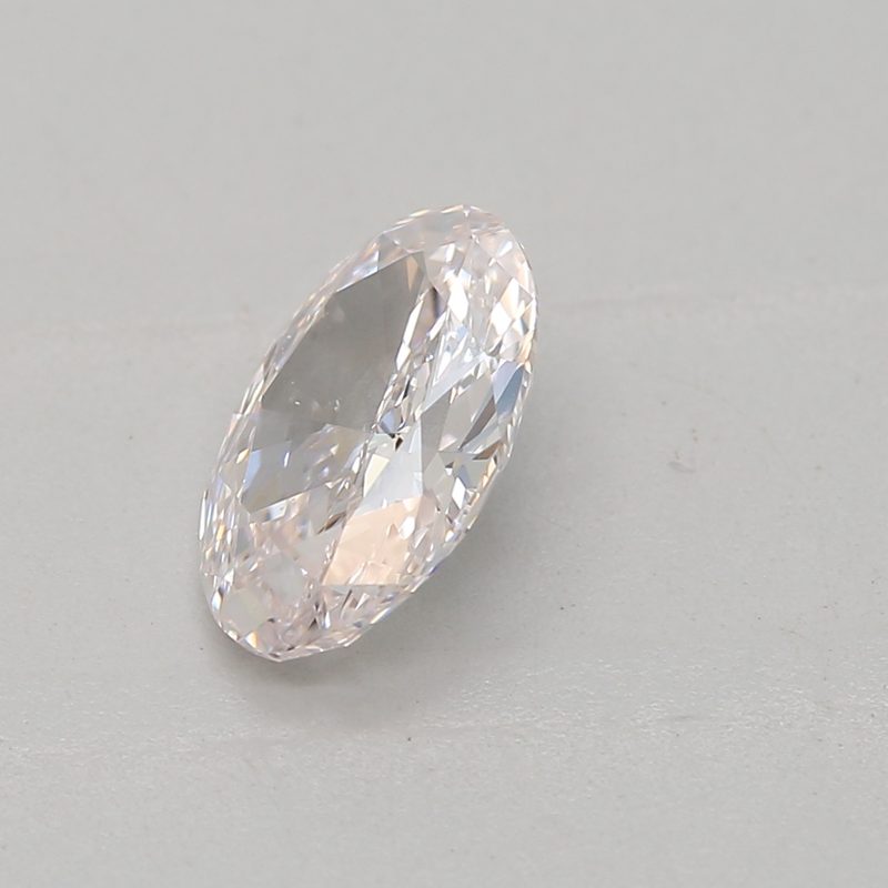 0.47 carat faint pink oval diamond certified by GIA