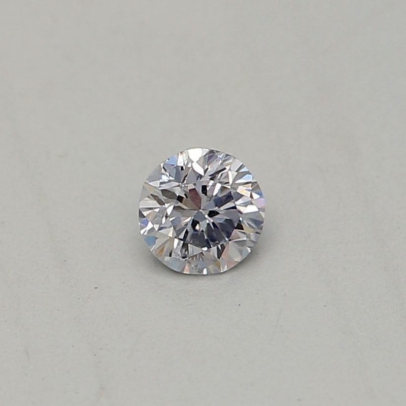 0.06 carat light blue round diamond certified by GIA