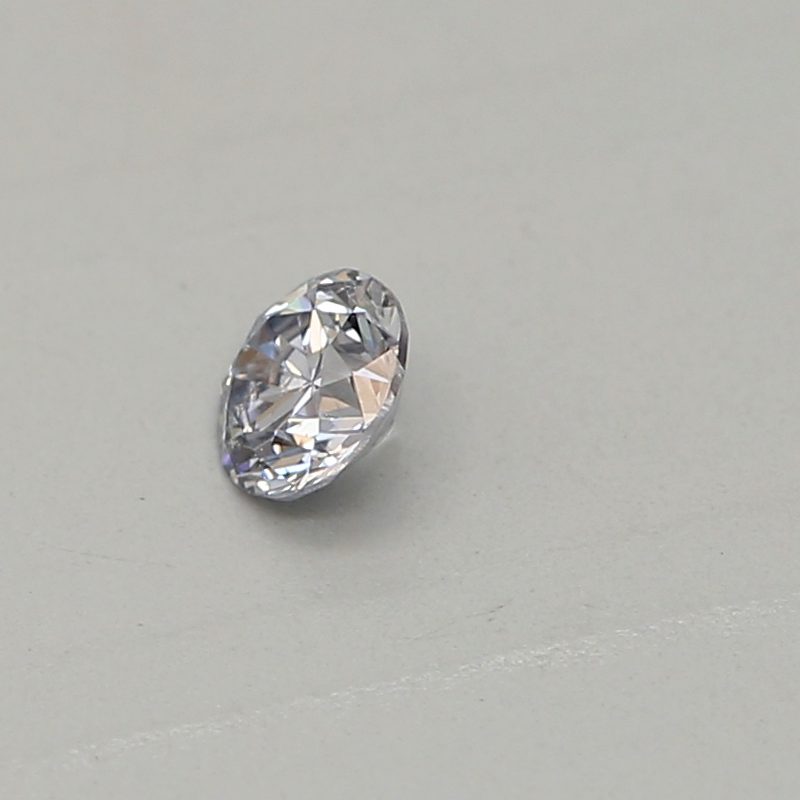 0.06 carat light blue round diamond certified by GIA