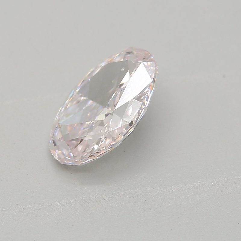 0.62 carat faint pink oval diamond certified by GIA