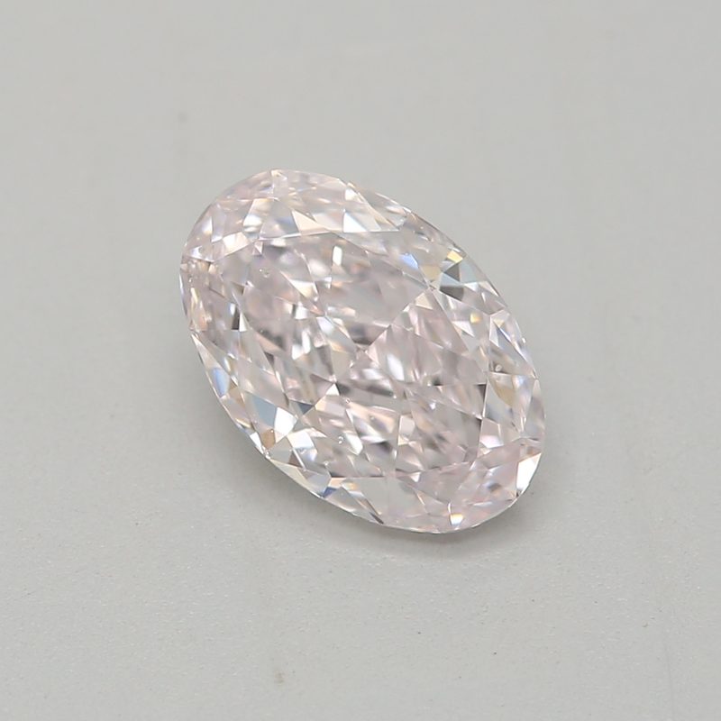 0.62 carat faint pink oval diamond certified by GIA