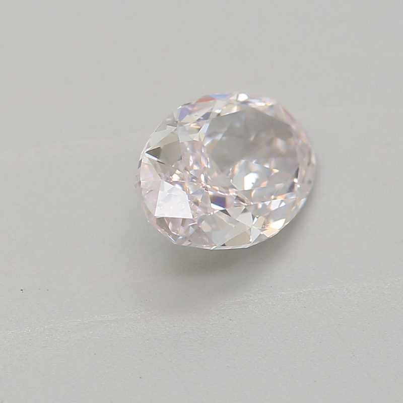 0.62 carat faint pink oval diamond certified by GIA