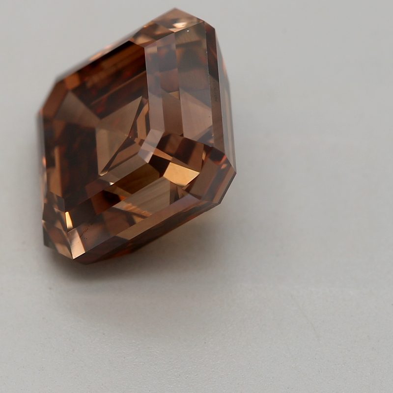 3.24 carat fancy deep orangy brown asscher diamond certified by DBIOD
