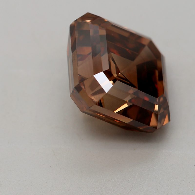3.24 carat fancy deep orangy brown asscher diamond certified by DBIOD