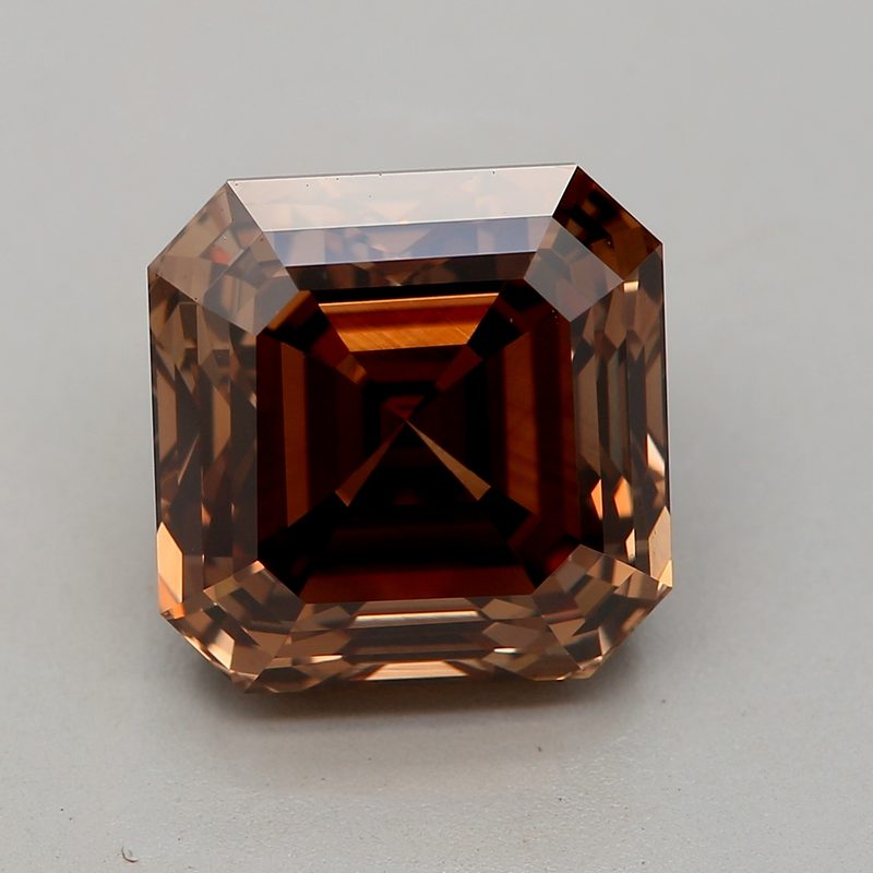 3.24 carat fancy deep orangy brown asscher diamond certified by DBIOD