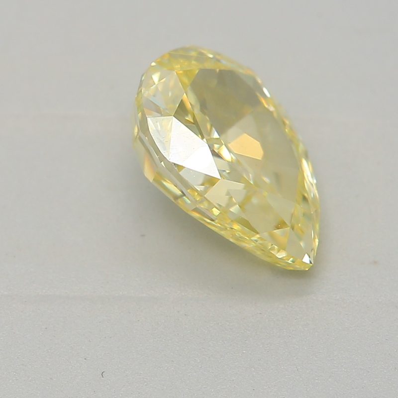 1.04 carat fancy intense yellow pear diamond certified by GIA