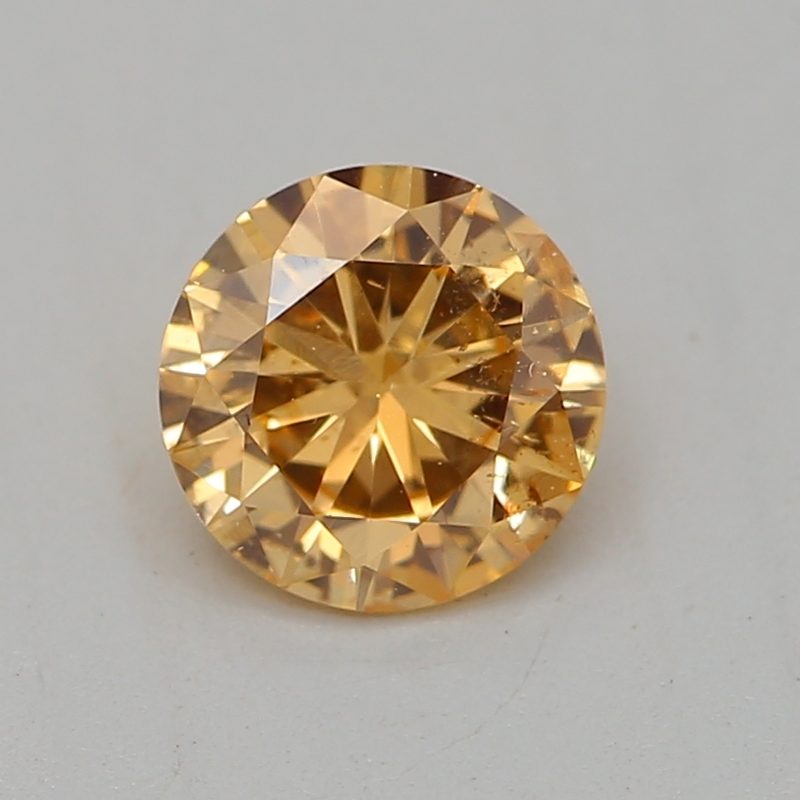 0.33 carat fancy intense yellow-orange round diamond certified by GIA