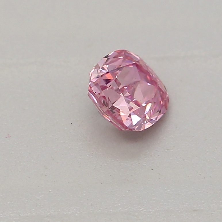 0.12 carat fancy intense purplish pink cushion diamond certified by GIA