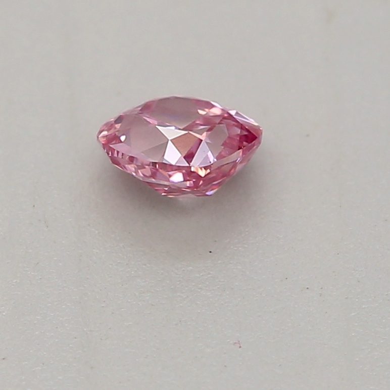 0.12 carat fancy intense purplish pink cushion diamond certified by GIA