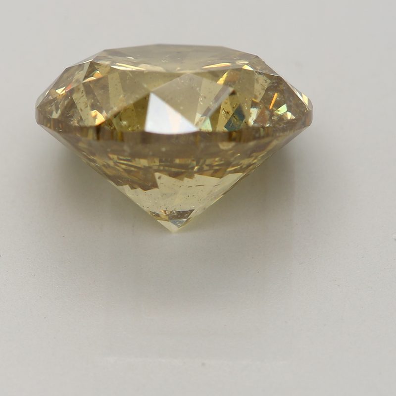 6.03 carat fancy brownish yellow round diamond certified by GIA