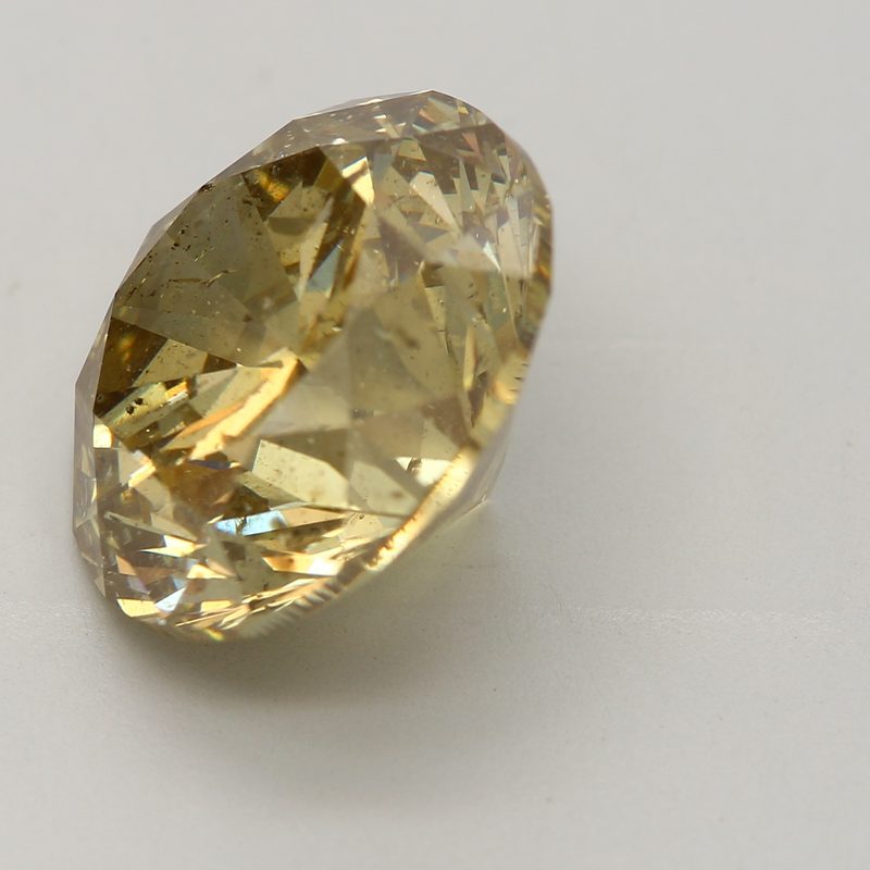 6.03 carat fancy brownish yellow round diamond certified by GIA