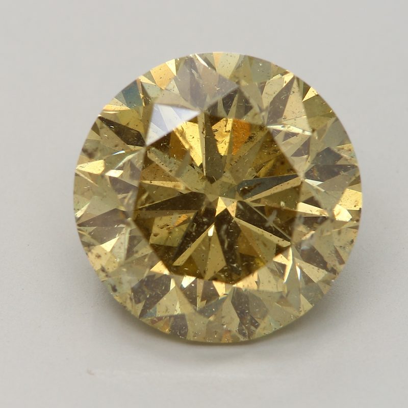 6.03 carat fancy brownish yellow round diamond certified by GIA