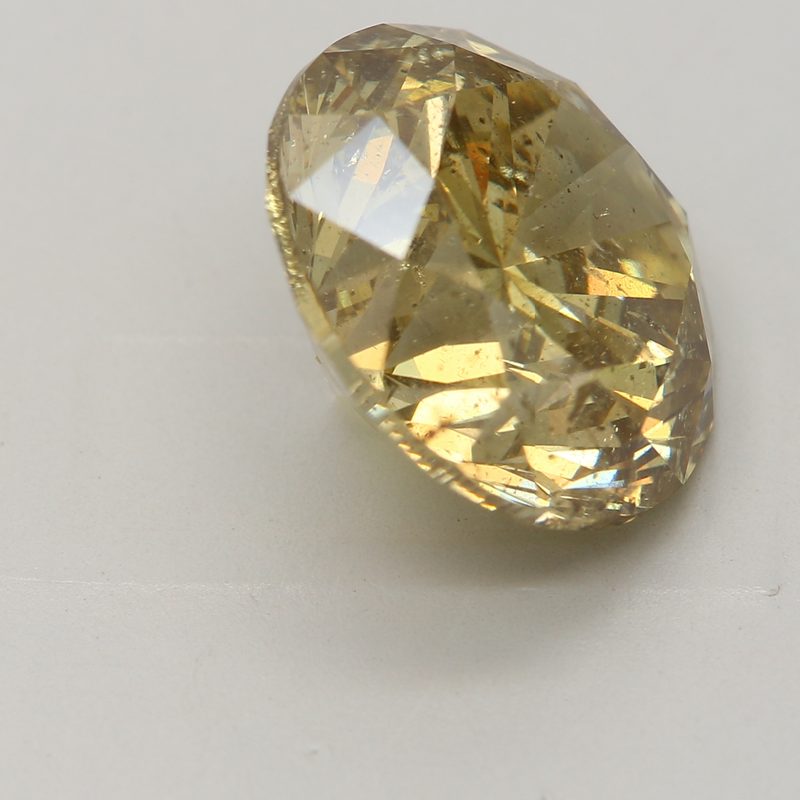 6.03 carat fancy brownish yellow round diamond certified by GIA
