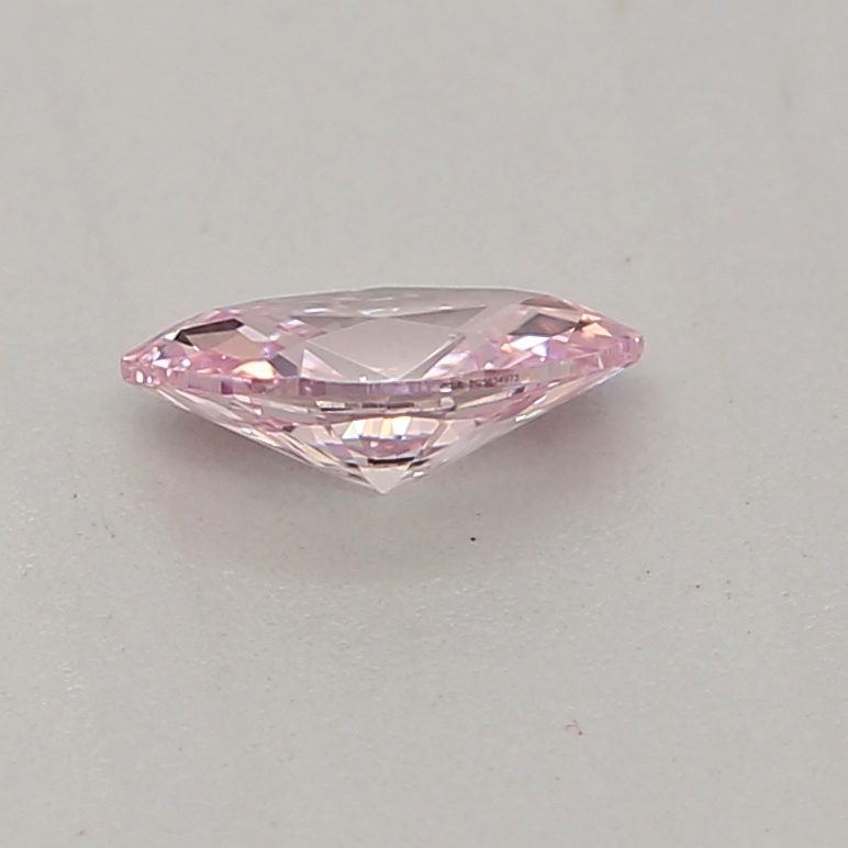 0.12 carat fancy purplish pink marquise diamond certified by GIA