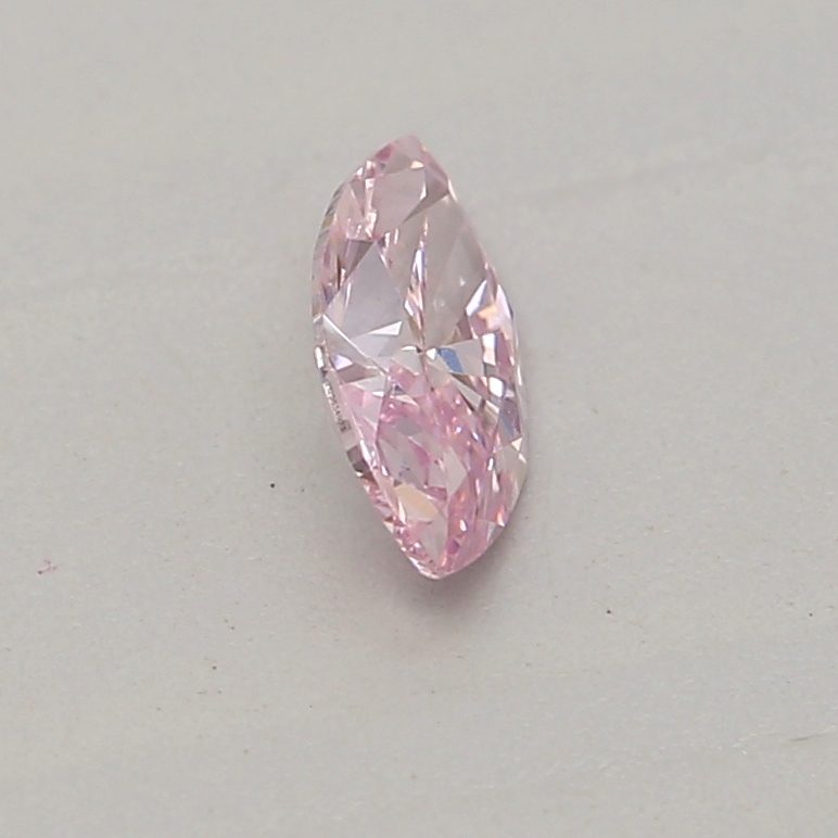 0.12 carat fancy purplish pink marquise diamond certified by GIA