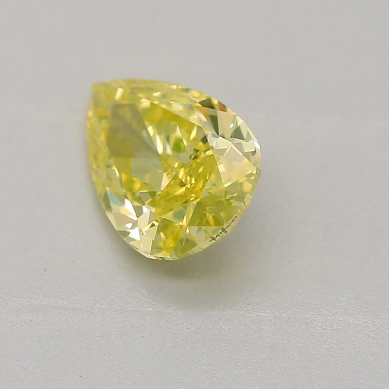 0.5 carat fancy intense greenish yellow pear diamond certified by GIA