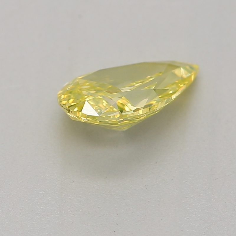 0.5 carat fancy intense greenish yellow pear diamond certified by GIA