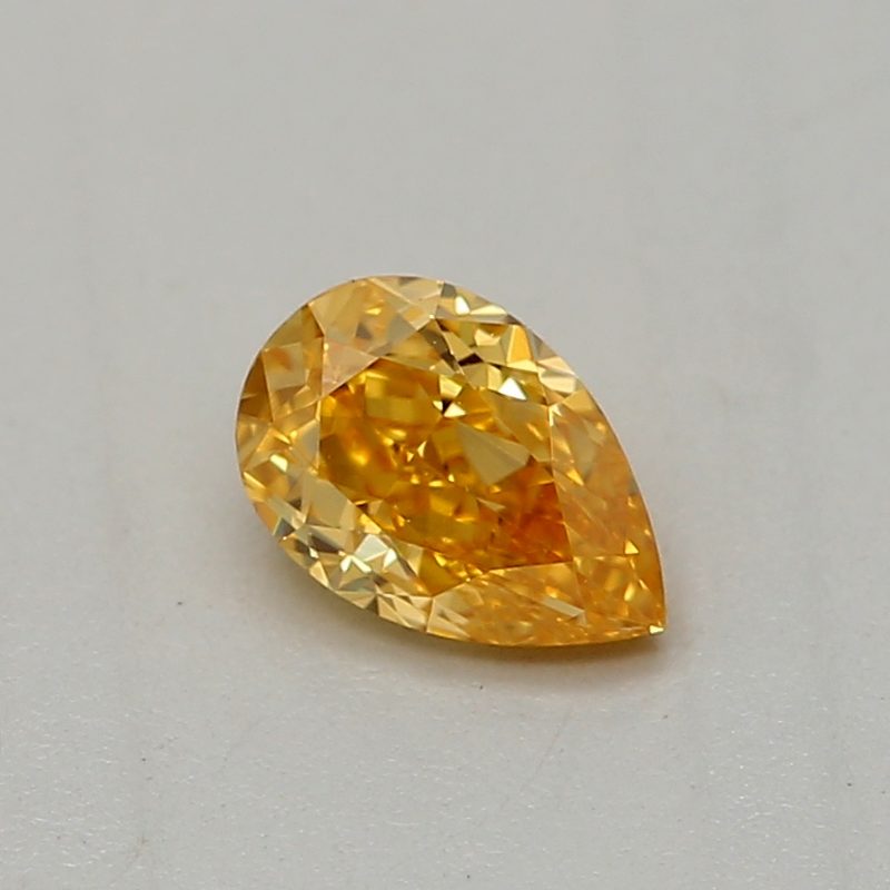 0.2 carat fancy vivid yellow-orange pear diamond certified by GIA